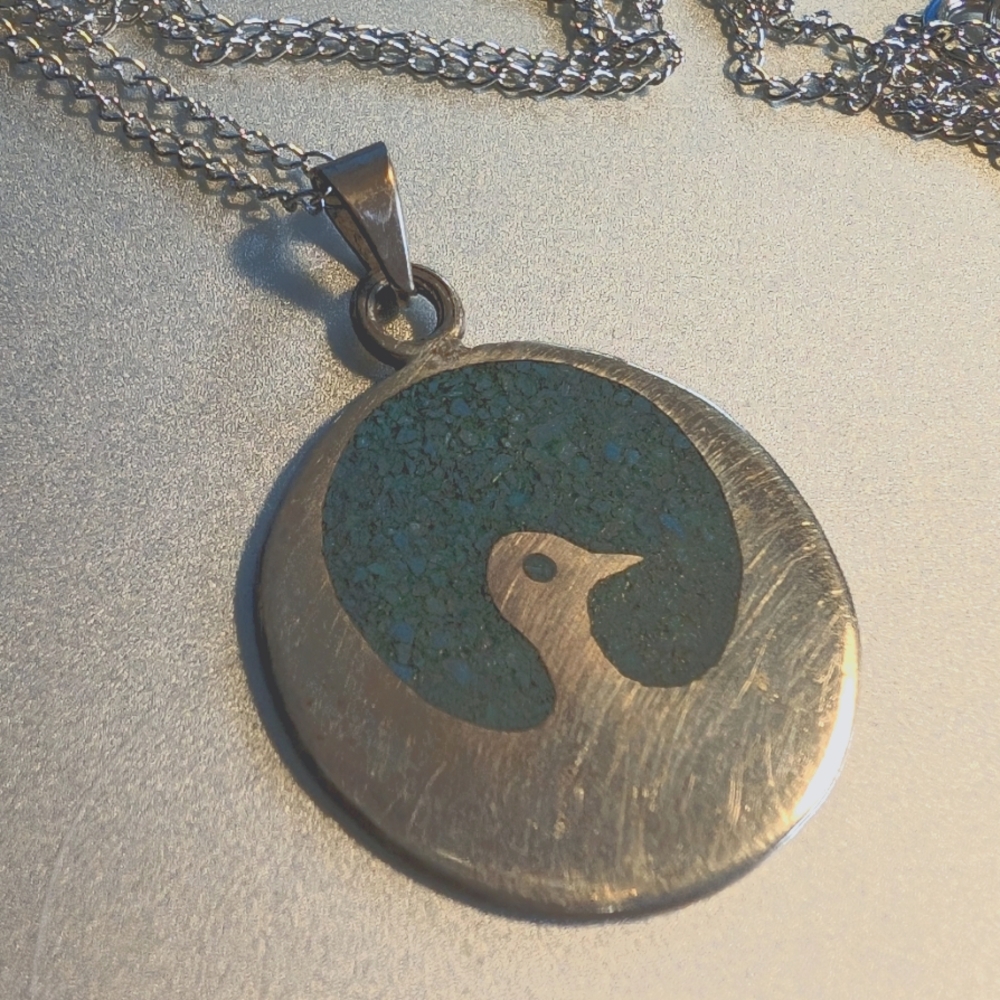 Phoenix/Thunderbird silver pendant